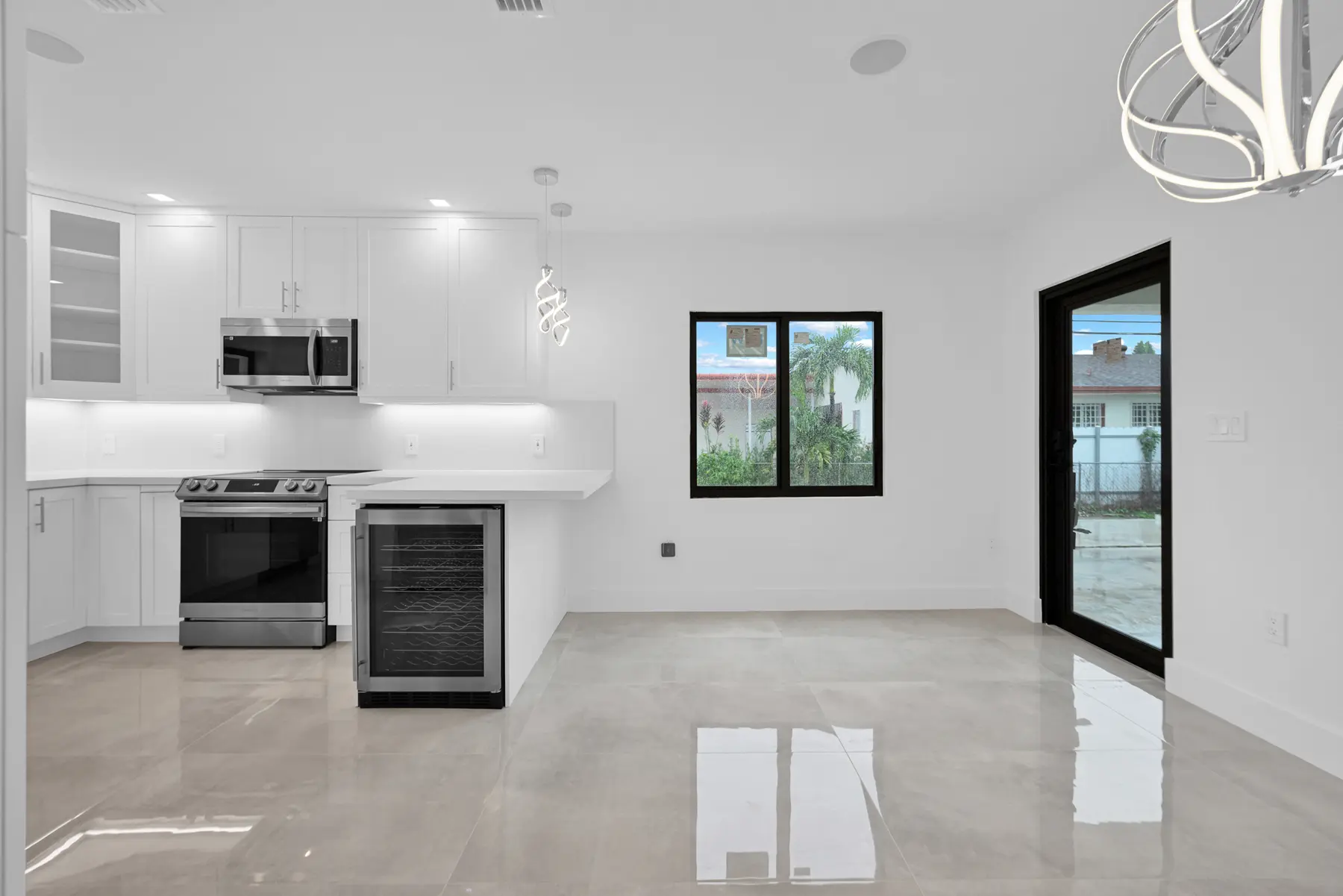 Completed open-concept kitchen renovation by SolidPeak Builders